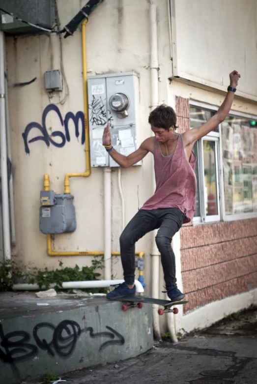 a  doing tricks on a skateboard outside