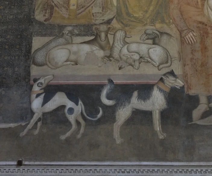 a very elaborate painting with some dogs in front of them