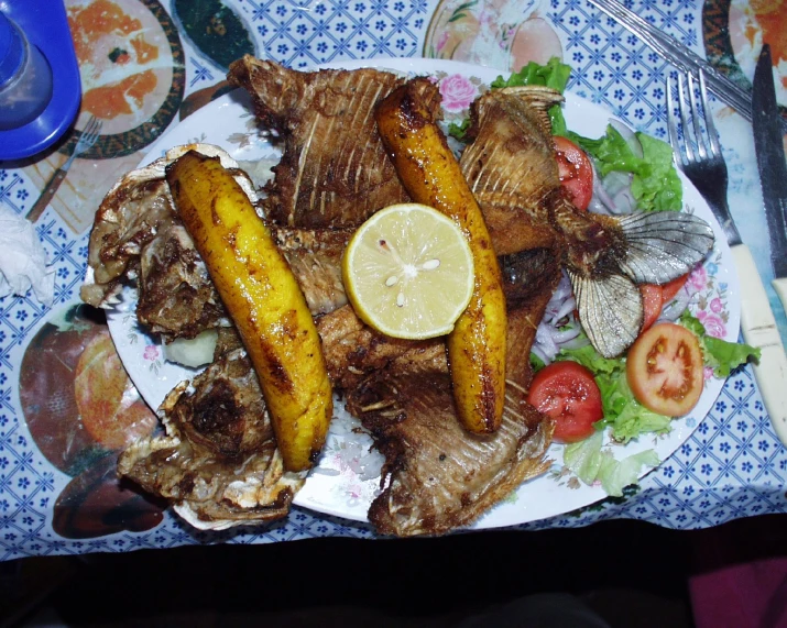 an assortment of foods on a white plate