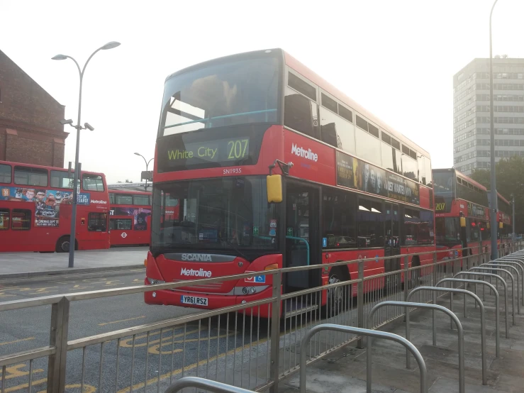 a double decker bus that is parked on a street