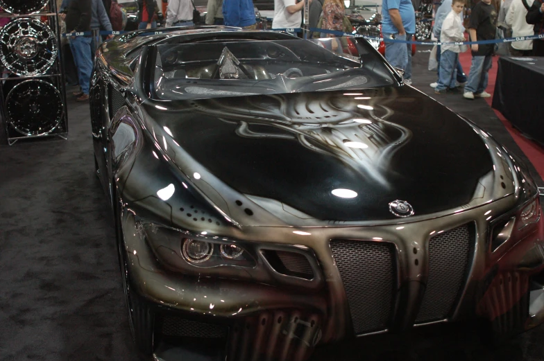 a car with a hood painted like the predator