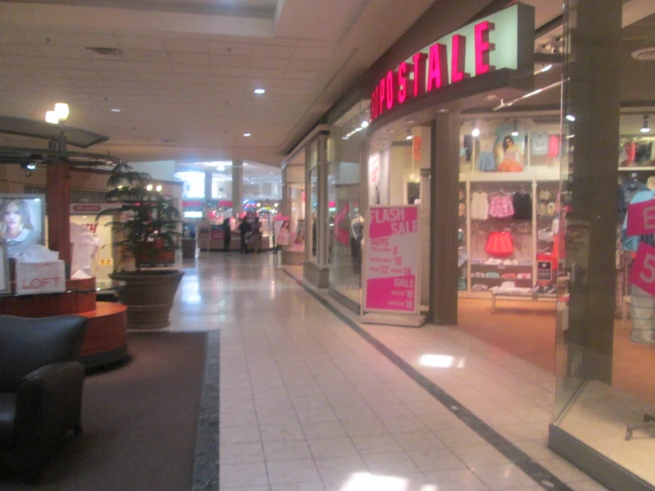 the inside of a store showing the outside of a door