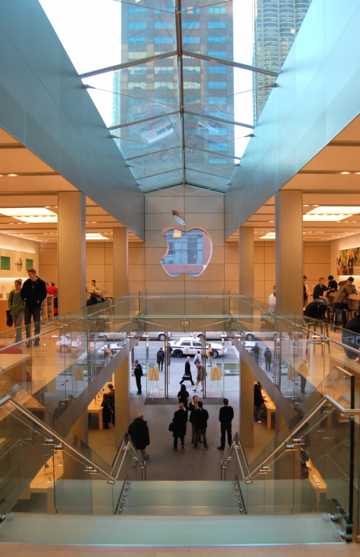 the inside of an apple store with lots of people