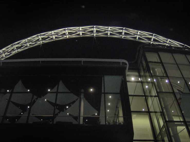 an arch is lit up and it seems to be lighting