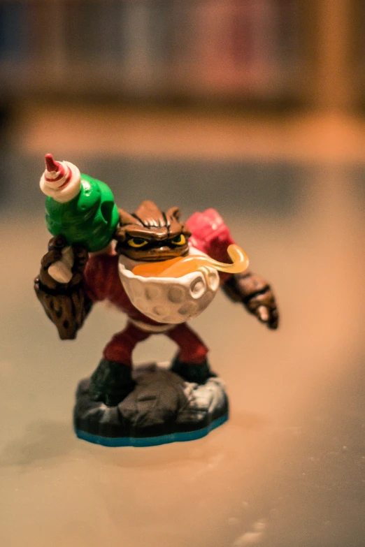 the figurine has a small hat on its head