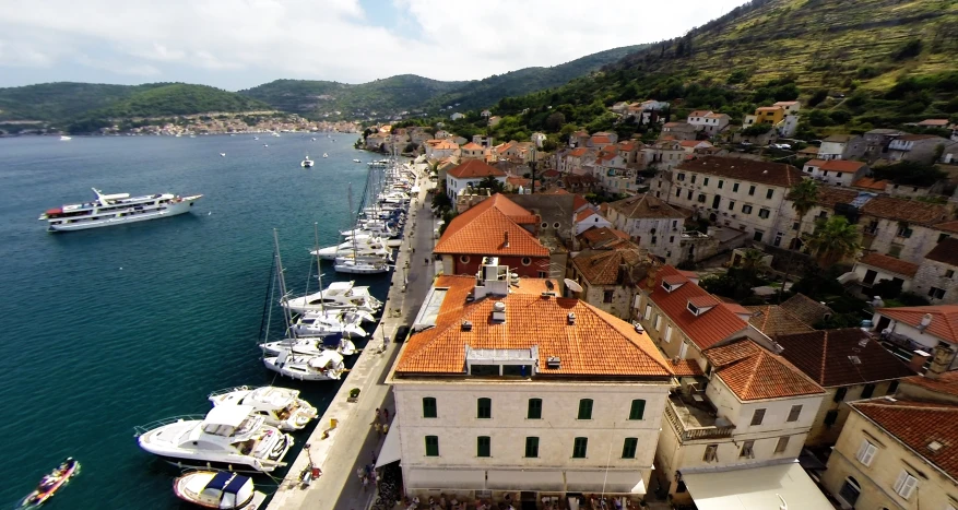 an aerial view of many boats and buildings