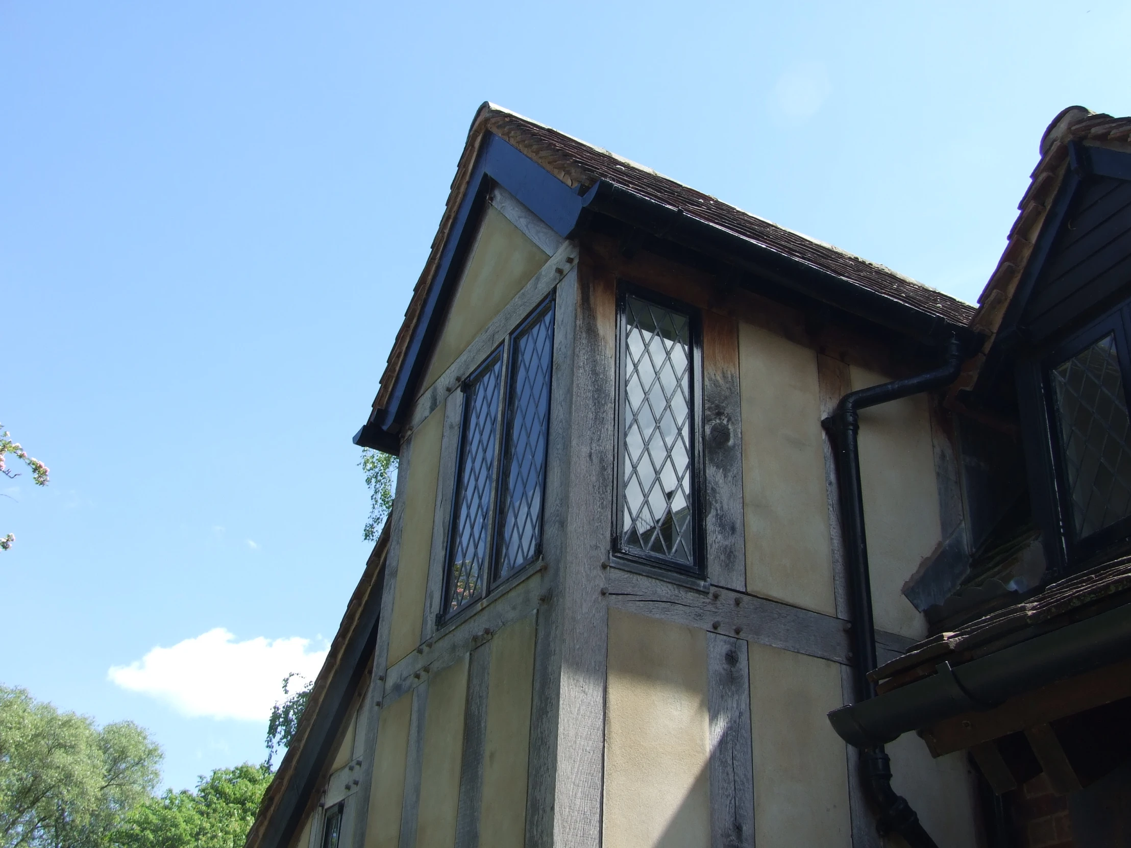 the building with a black and white window and no door