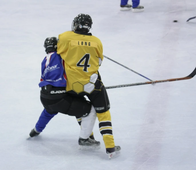 two players who are in action on the ice