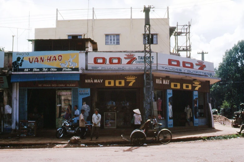 a street with many motorcycles parked in front of it