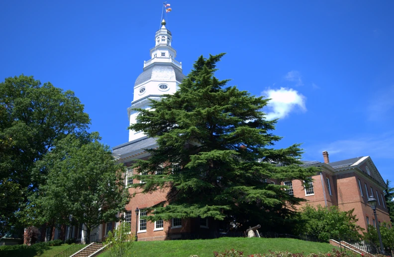 a building has a tower with a clock on the top