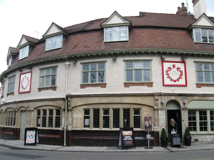 the building is very old looking and has a very unique round - shaped window