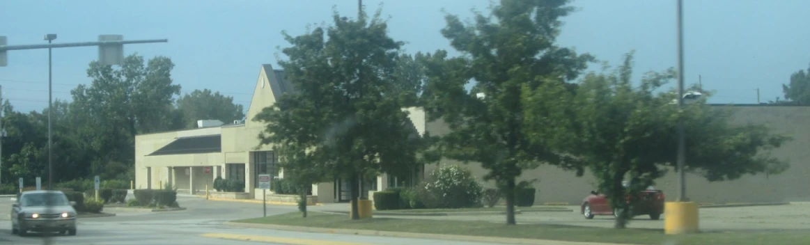 the street view in this suburban area has many trees