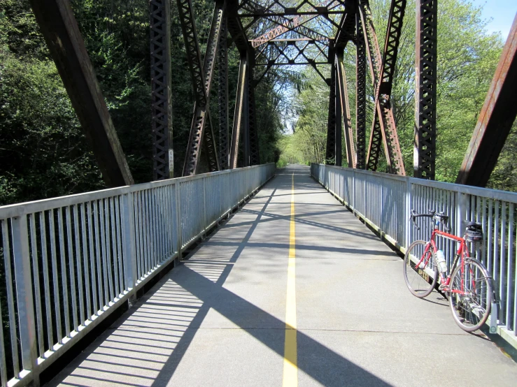 the bridge is shown with a bike on it