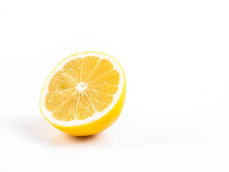 an orange slice has been cut into four pieces