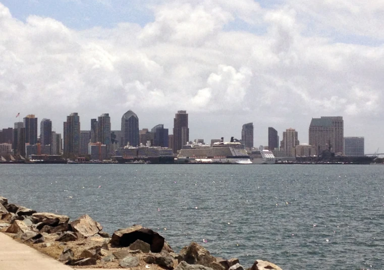 a large cruise ship on the ocean in the background