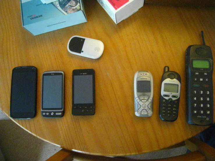 there are four cellphones that can also be used on the table