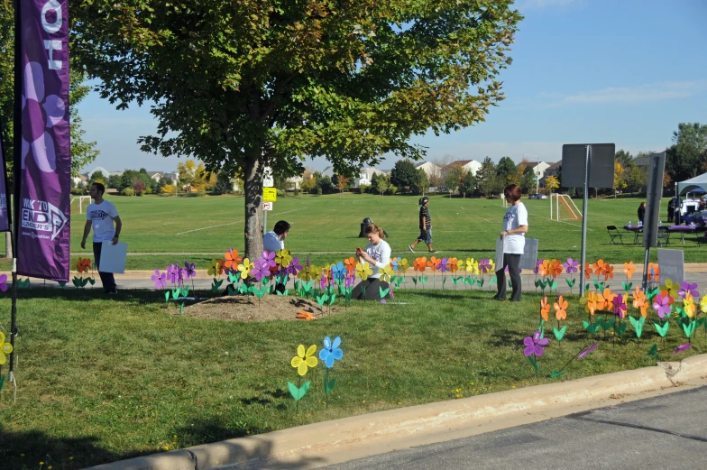 s are at the park making their own flower garden