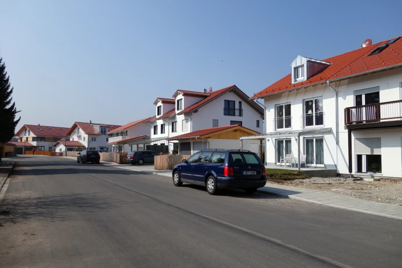 a few cars that are sitting in the street