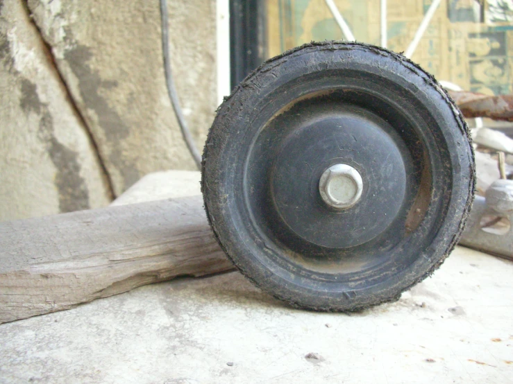 old wheel bearing hub of motor vehicle on rock