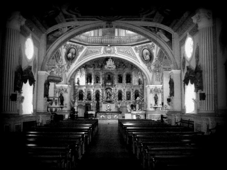 the inside of a church that has black and white pograph