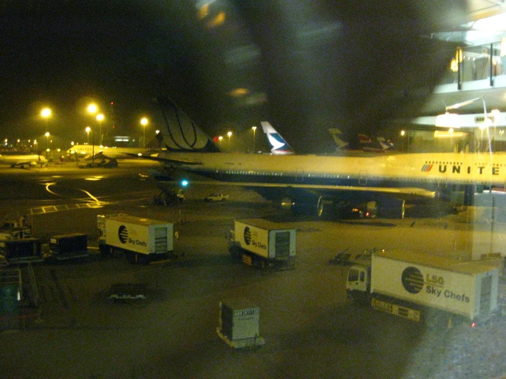 a airplane on an air port run way at night