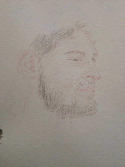 a man's portrait in colored pencil on white paper