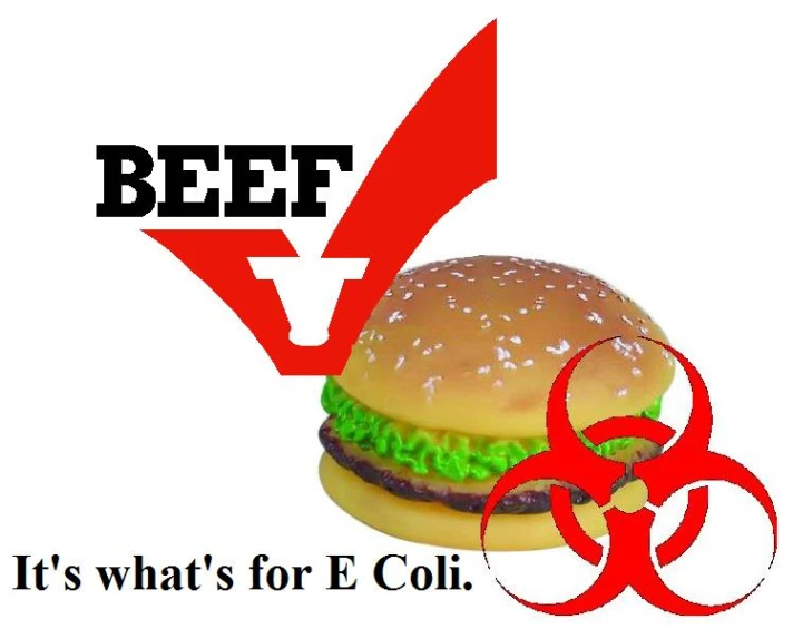 a hamburger with a warning sign in the background