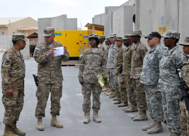 a group of military men standing near each other