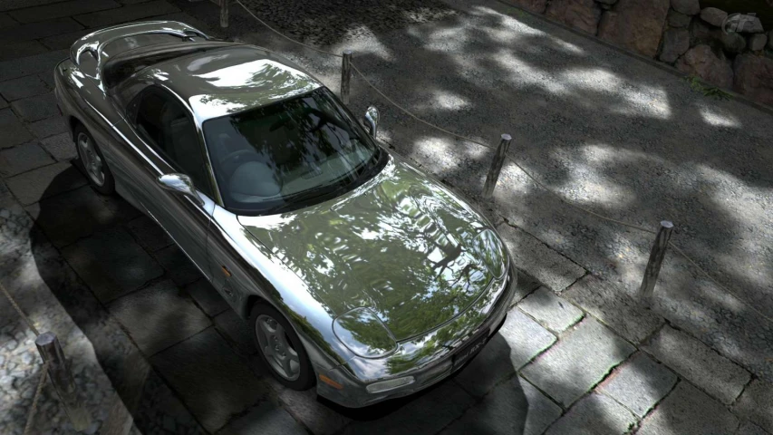 a silver car parked on the side of a street