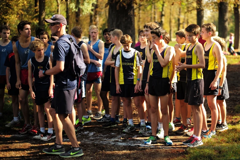 the men are lined up and having a discussion