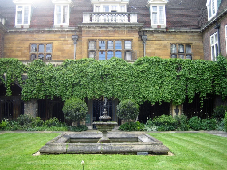 a large building with ivy on the front and sides of it