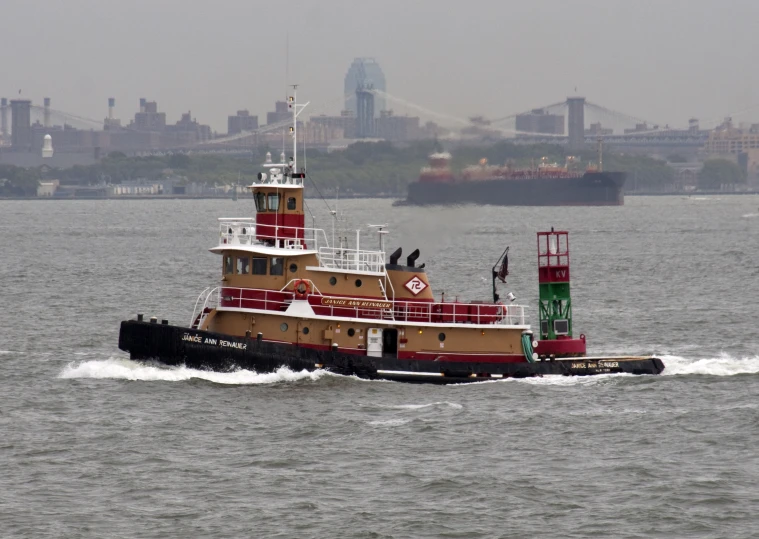 a large tugboat in the middle of the water