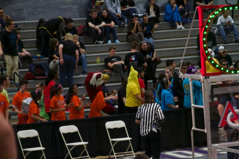 a person standing on top of a basketball court