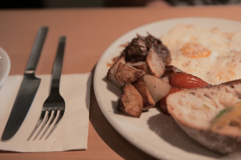 a close up of an omelet on a plate