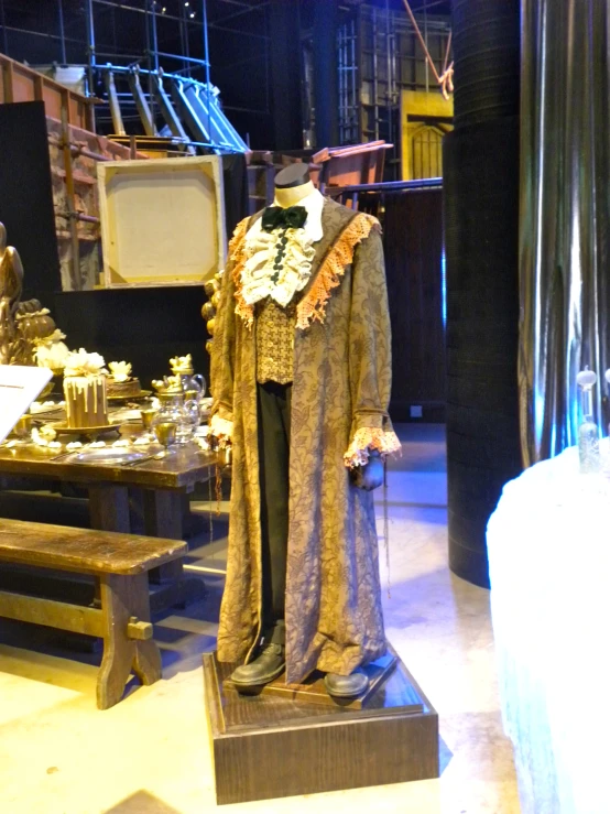 this is a historical display with the image of a man wearing a hat and coat