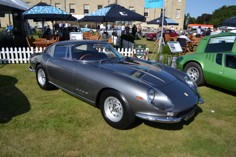 a classic race car in the grass