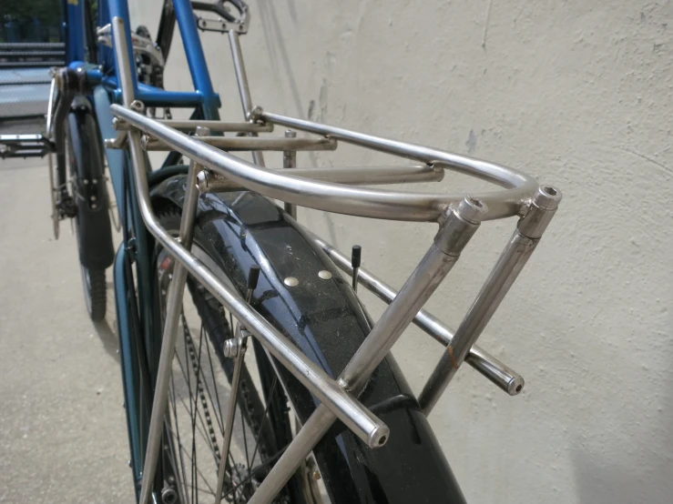 a close up of a bike with a handle bar attached to it