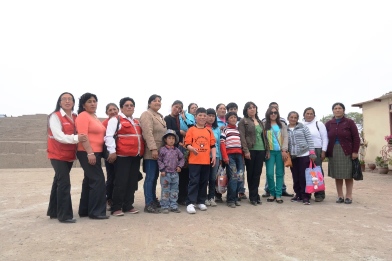 a large group of people in front of a building