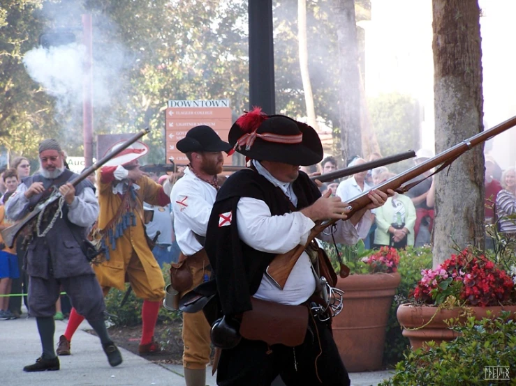 the people are taking their position while holding rifles