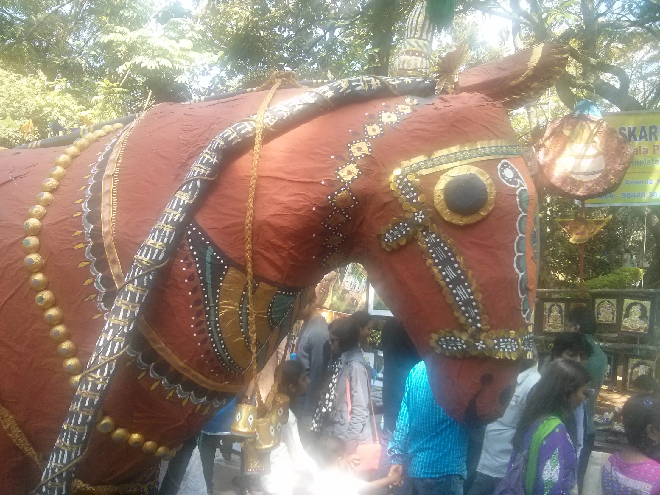 the horse is decorated with beads and beads