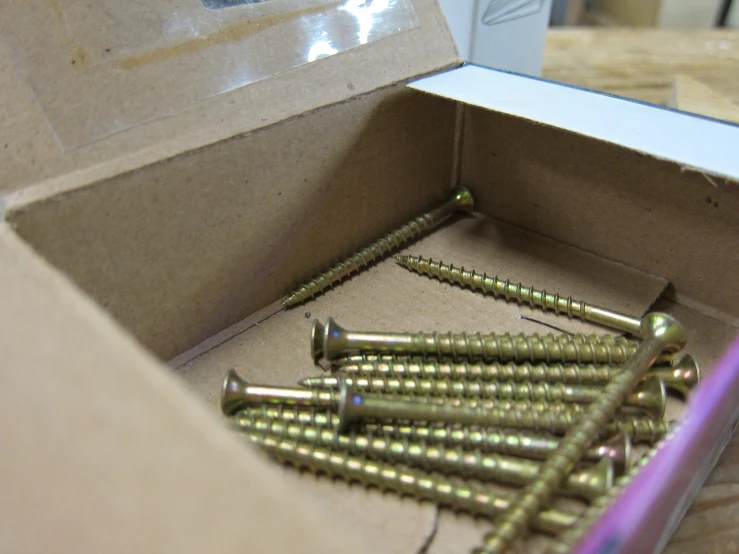 the assortment of nails are in a box