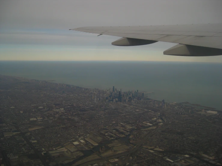 a view from a plane that appears to be flying over some city