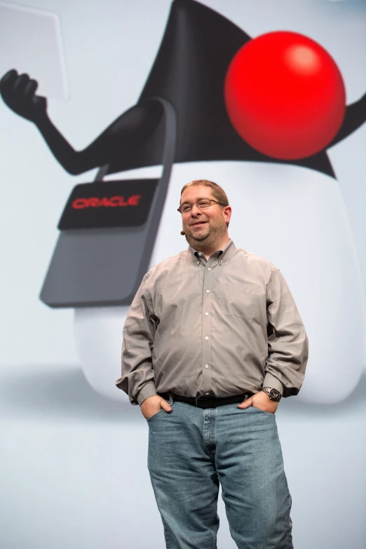 a man is posing with his hands on his hips