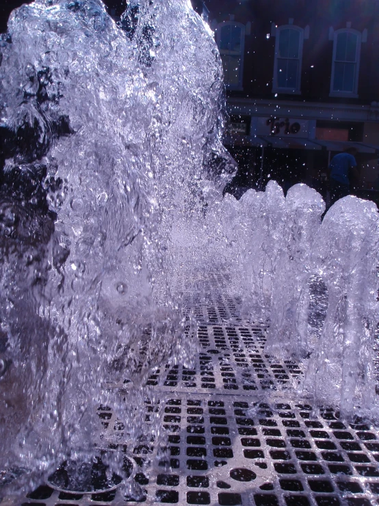 water spouting out of a drain that has been closed