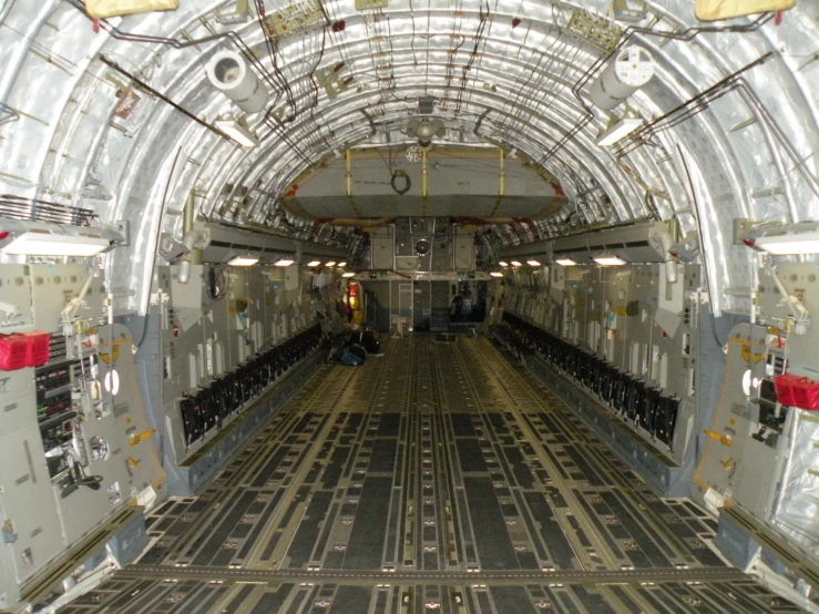 the inside of an airplane with a lot of metal objects