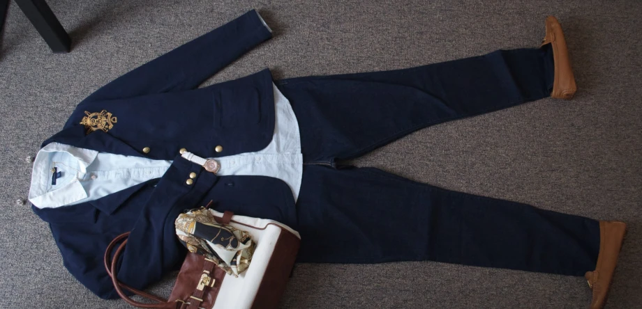 a jacket and hat laying on the floor