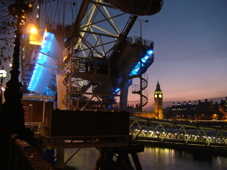 big ben at dusk over a bridge in the city