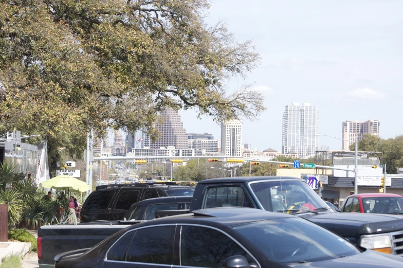 the city is behind cars, waiting for a parking meter