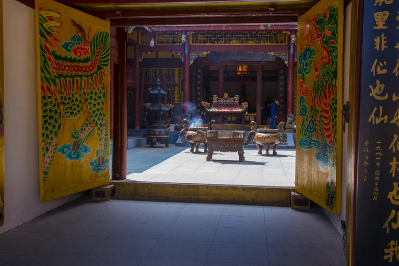 two doorways are decorated with oriental designs and decor