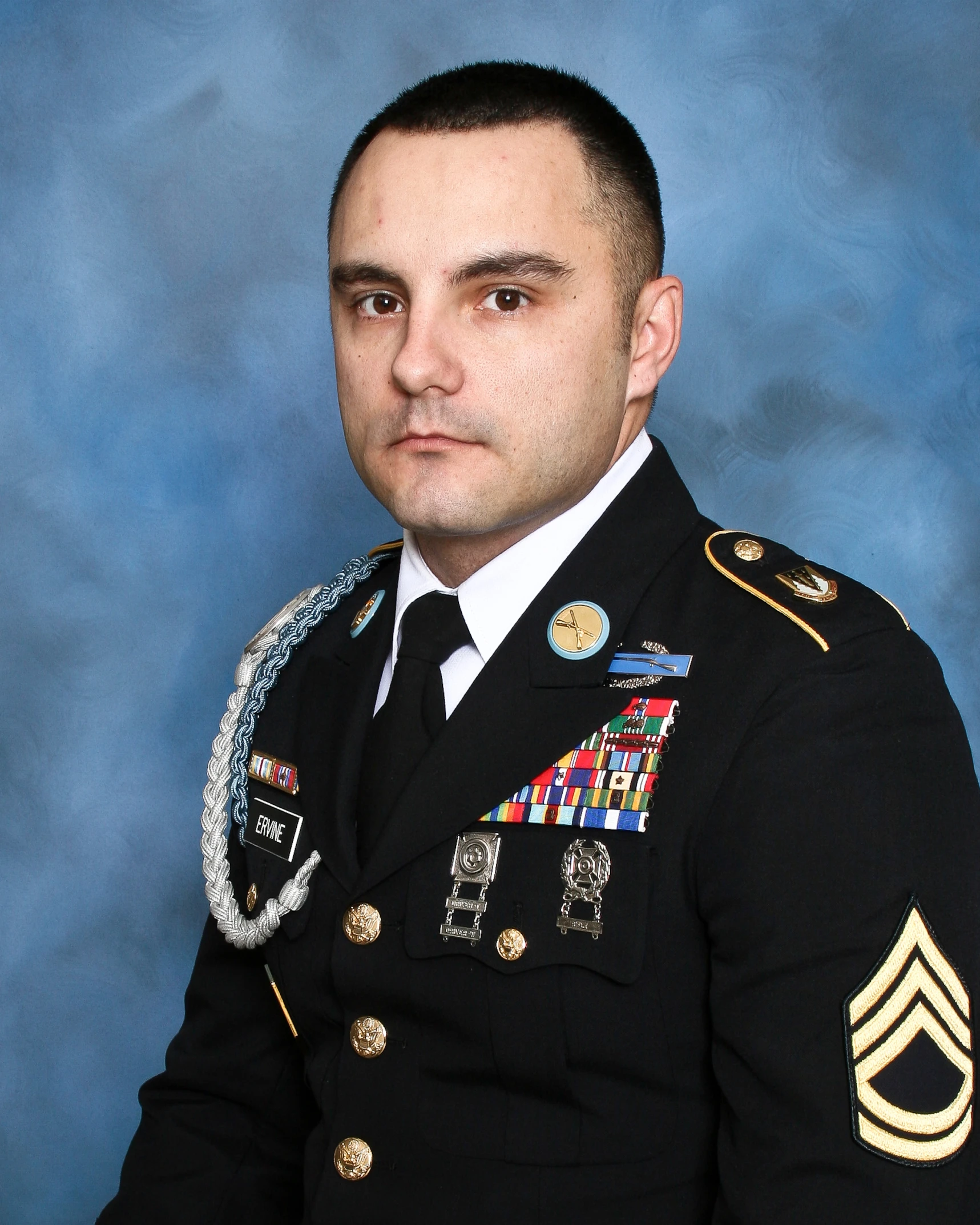 a young man dressed in military uniform